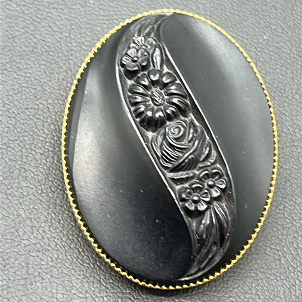 Vintage molded black glass and gold tone floral mourning brooch pin